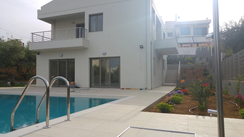 Expansion and renovation of an existing two store house and addition of an external pool